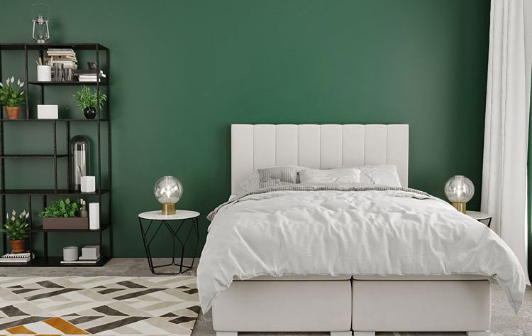 ściana w sypialni w kolorze butelkowej zieleni 